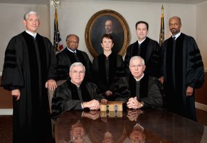 Back Row L-R David Nahmias, Robert Benham, Carol Hunstein, Keith Blackwell and Harold Melton. Front Row L-R Presiding Justice Harris Hines and Chief Justice Hugh Thompson. Handout Photo 7-14-2014